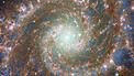 Pan of Combined optical/mid-infrared image of M74 (Hubble and Webb)